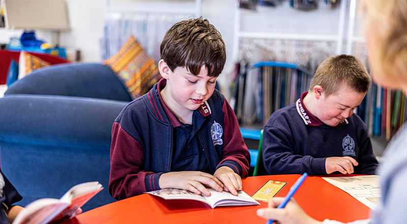 Student reading at St Finbar’s Catholic Primary Glenbrook