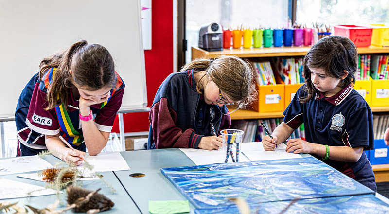 Students creating art in the creative art space at St Finbar's Primary School Glenbrook