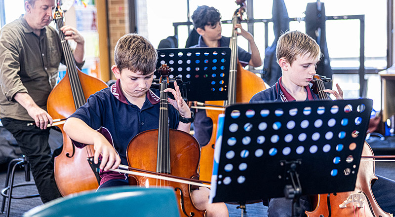 Students playing instruments in the contemporary music space at St Finbar's Primary School Glenbrook